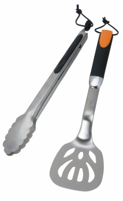 Cozze grill set with stainless steel tongs and spatula.
